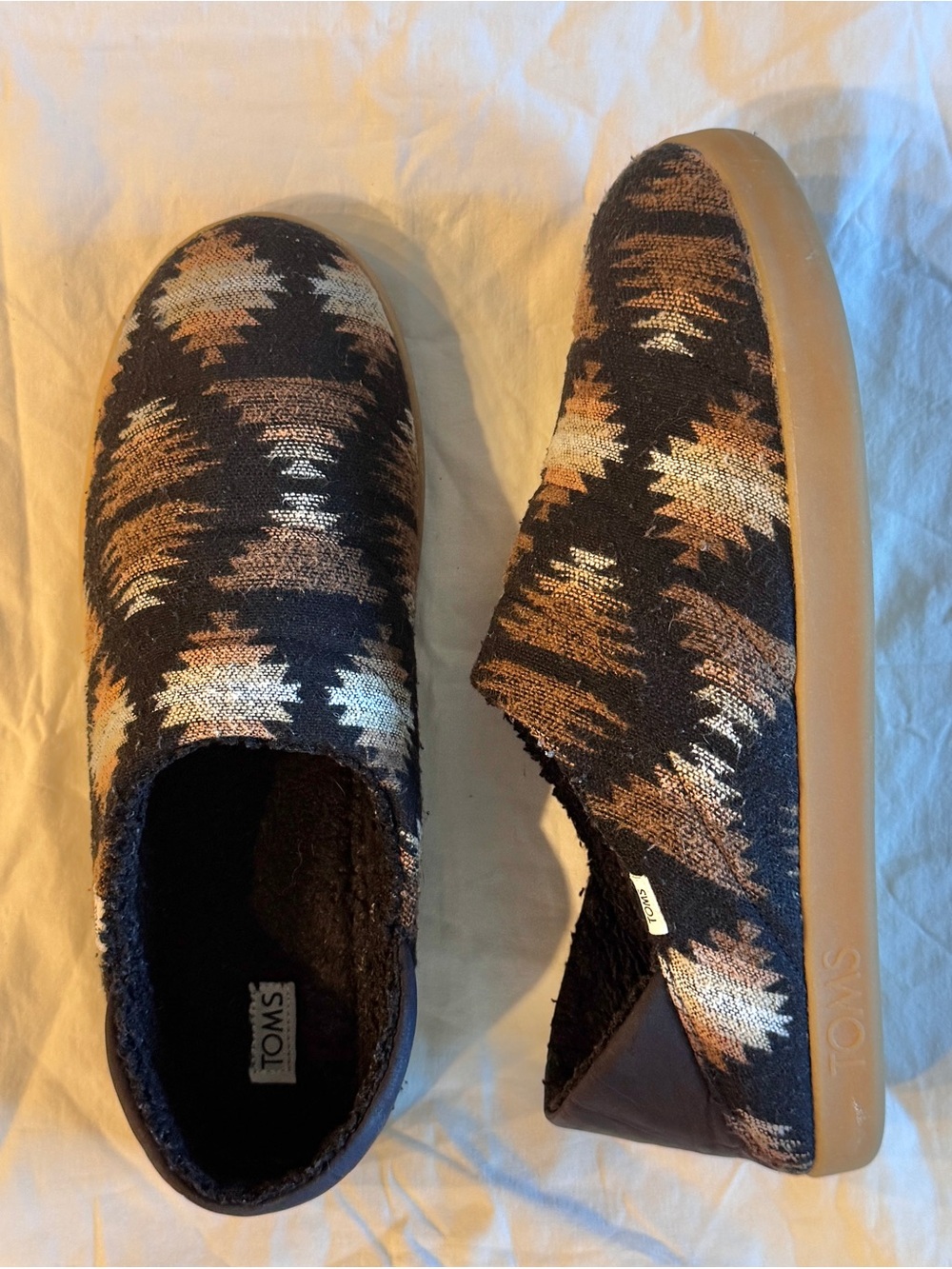 TOMS Men’s Slip-On Shoes in Black and Copper Aztec Print size 10.5
